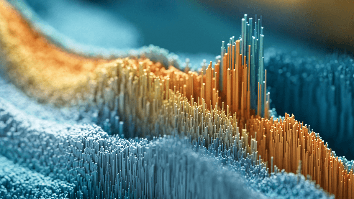 Close-up of a wave formed by intertwining colored lines, showcasing a spectrum of hues and fluid motion forming a chart.